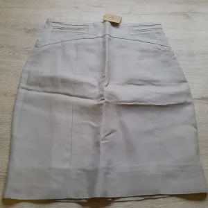 FALDA CORTA BEIGE TUBO