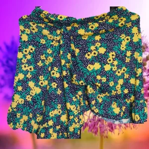 FALDA CORTA NEGRA CON ESTAMPADO