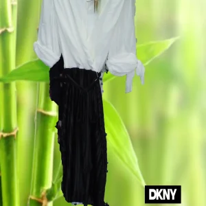 VESTIDO CON MANGA FRANCESA BLANCO Y CON FALDA NEGRA PLISADA ( TARA COSTURA DEFECTUOSA EN FALDA - PARTE TRASERA - ) DKNY