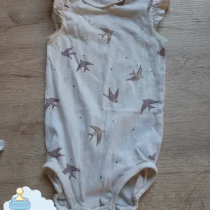 BODY BEIGE BEBE CON ESTAMPADOS