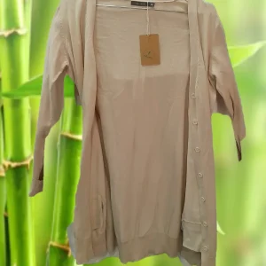 CHAQUETA MUJER BEIGE DE PUNTO LARGA