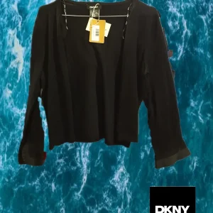 REBECA NEGRA DKNY ( TARA DESCOSIDO EN CUELLO )