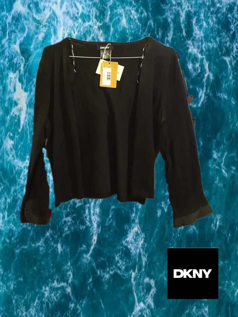 REBECA NEGRA DKNY ( TARA DESCOSIDO EN CUELLO )