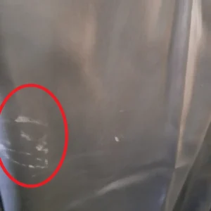 CAMISETA MANGA LARGA NEGRA POLIPIEL DKNY ( TARA ROZADA PARTE DELANTERA )