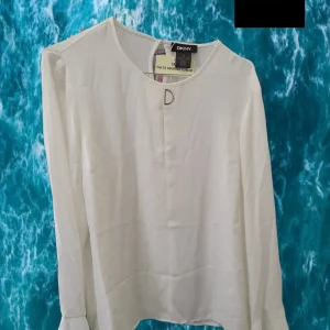BLUSA BLANCA MANGA LARGA DKNY ( TARA FALTA ADORNO CUELLO )