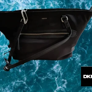 BOLSO NEGRO DE TELA GRANDE DKNY ( TARA ROCE EN ASA Y MANCHA EN PARTE DELANTERA )