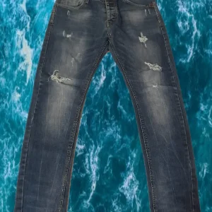 PANTALÓN VAQUERO CABALLERO CON ROTOS