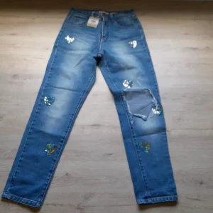 PANTALON VAQUERO SEÑORA CON DETALLES DE LENTEJUELAS