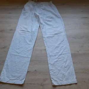 PANTALÓN BLANCO TIPO CHANDAL JASPEADO UNISEX