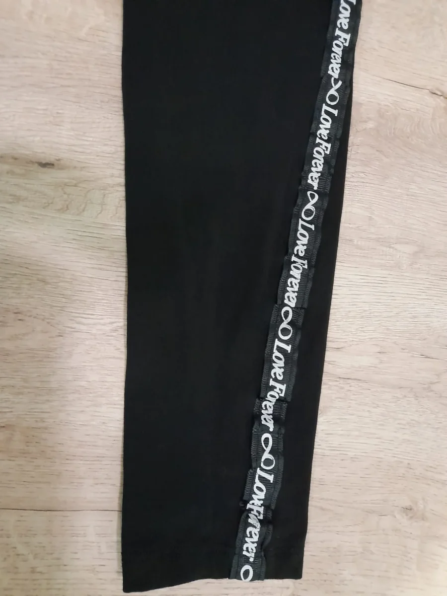 MALLA NEGRA CON LOGOTIPO EN PIERNAS - Imagen 3