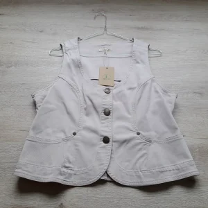 CHALECO VAQUERO BEIGE