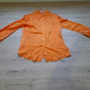 BLUSA M/L NARANJA